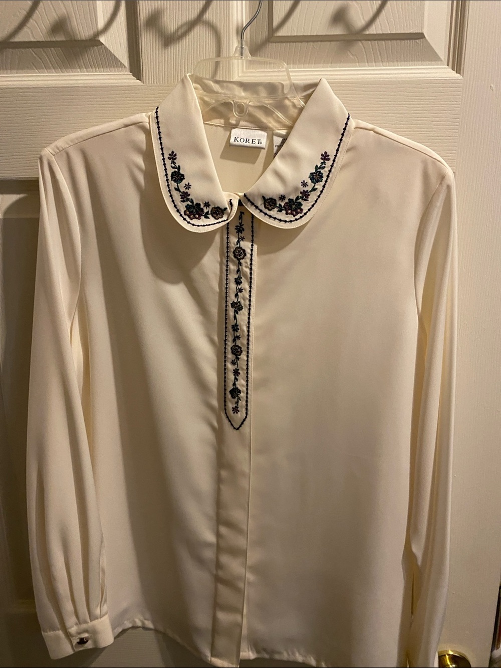 Koret Cream Blouse with Navy Floral Embroidery Trim
